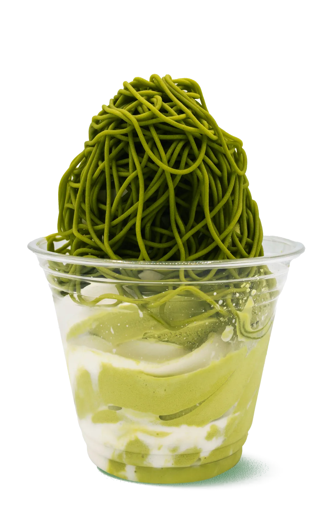 Matcha Mont Blanc dessert with bright green noodle-like topping on white cream layers in a clear cup. Japanese-inspired sweet treat with contrasting textures.