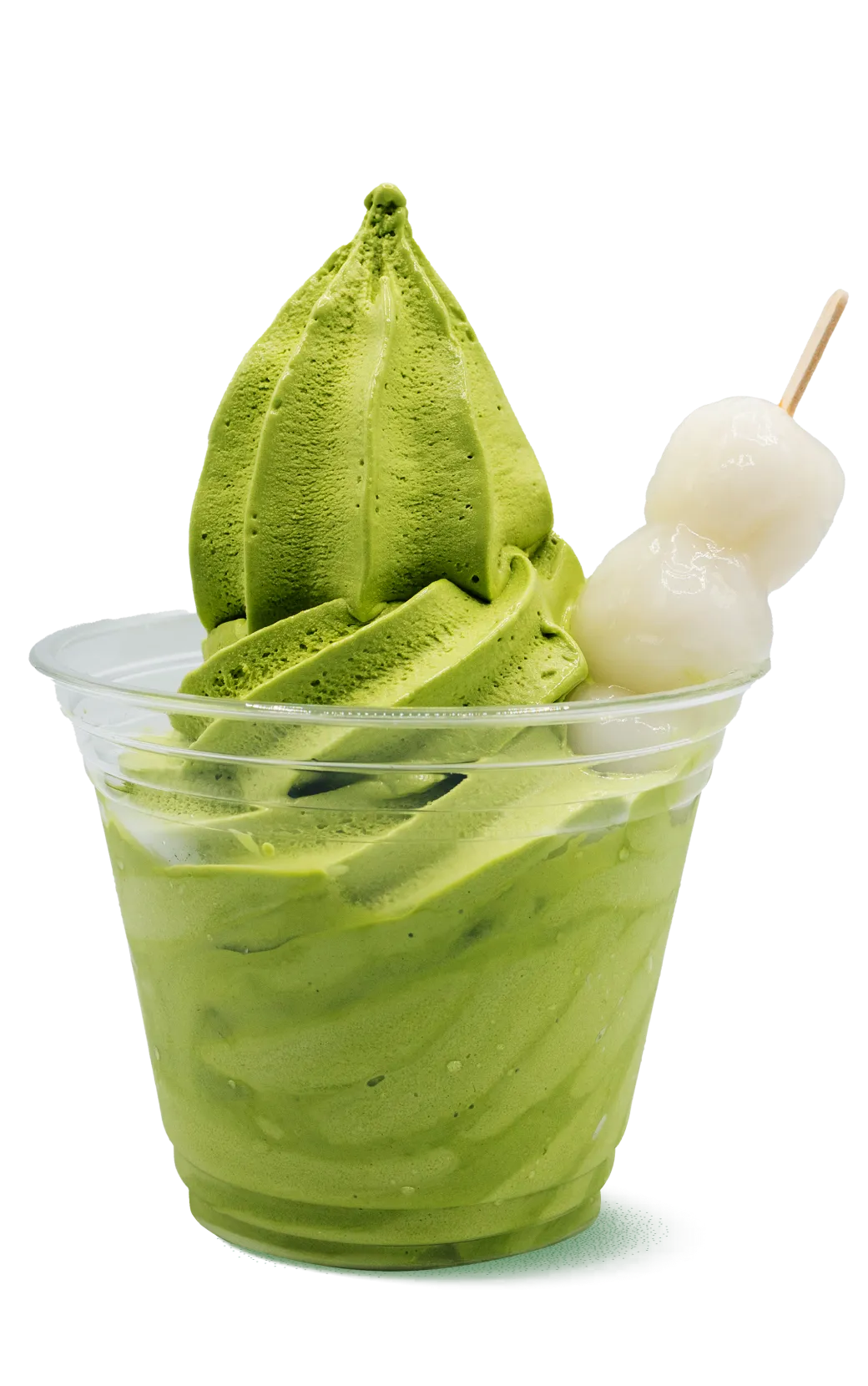 Bright green matcha soft serve with spiral peaks in a clear cup, accompanied by white rice dumplings (dango) on a bamboo skewer. Modern presentation of traditional Japanese flavors.
